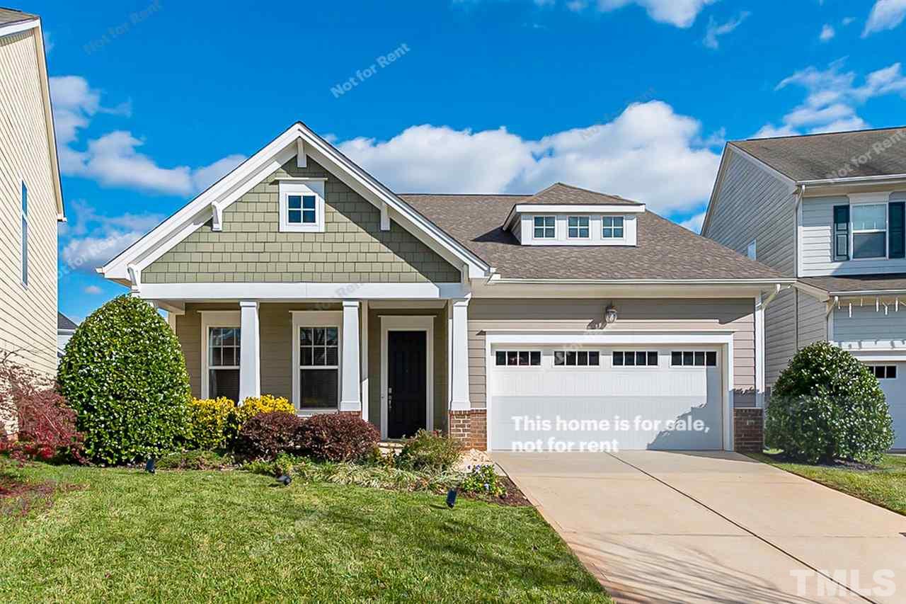 1225 Chapanoke Road Raleigh, NC 27603 - Photo 1 of 27 a front view of a house with a yard