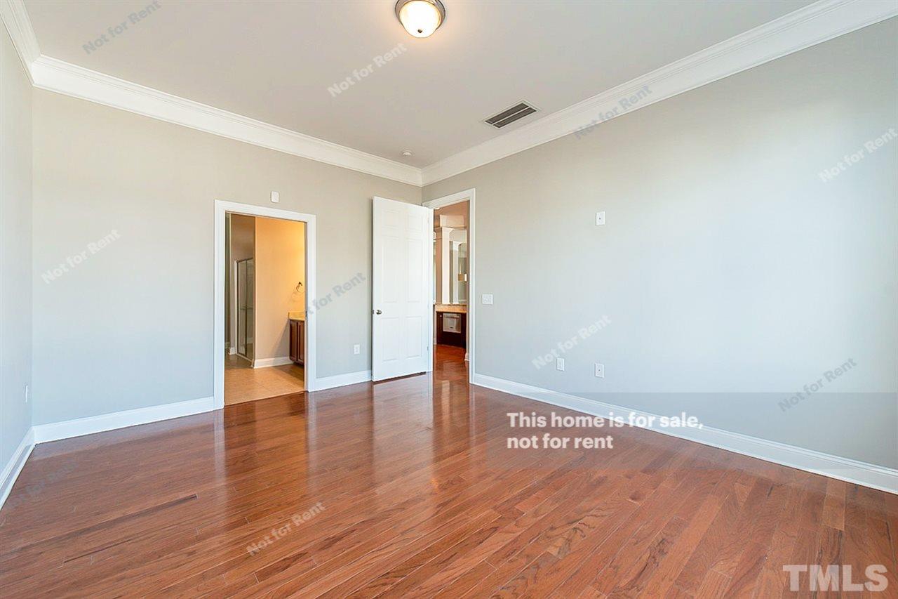 1225 Chapanoke Road Raleigh, NC 27603 - Photo 19 of 27 a view of empty room with wooden floor