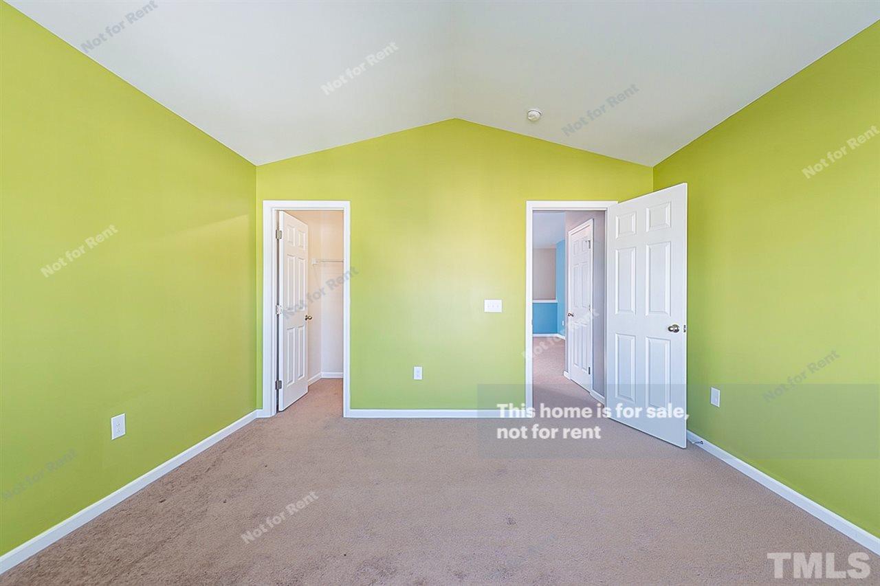 1225 Chapanoke Road Raleigh, NC 27603 - Photo 21 of 27 a view of a big room with windows