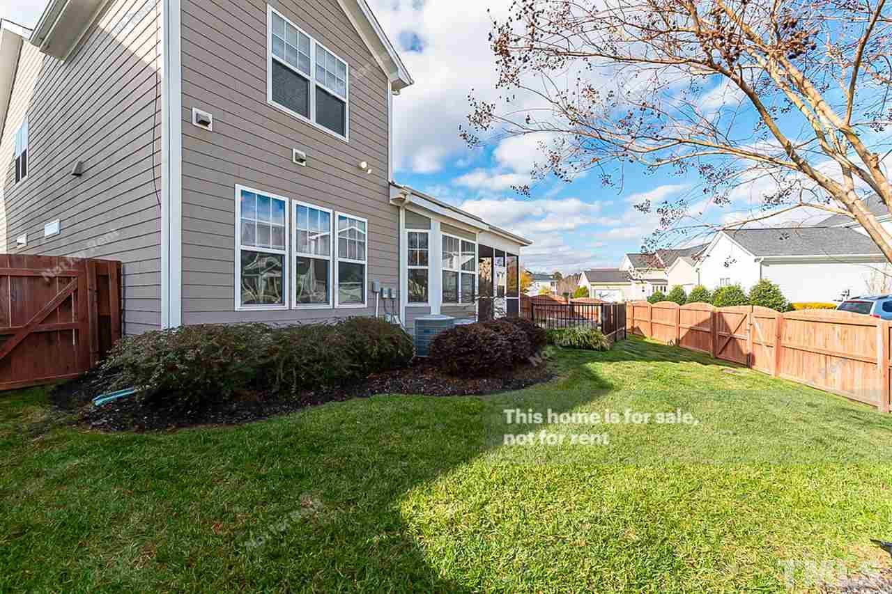 1225 Chapanoke Road Raleigh, NC 27603 - Photo 27 of 27 a view front of house with backyard space and garden