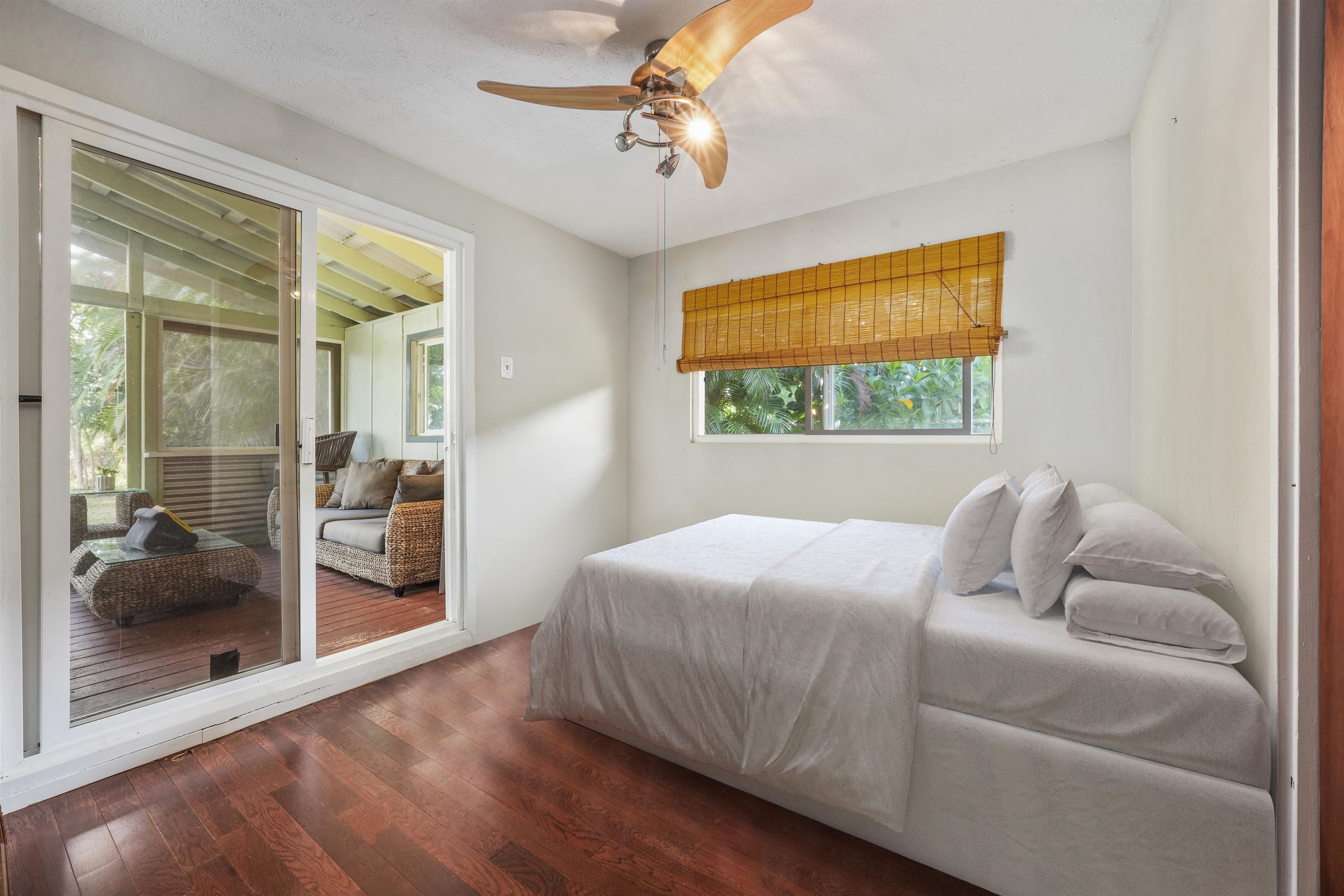 2889 West Lelehuna Place Haiku, HI 96708 - Photo 19 of 32 a bedroom with a bed and a walk in closet