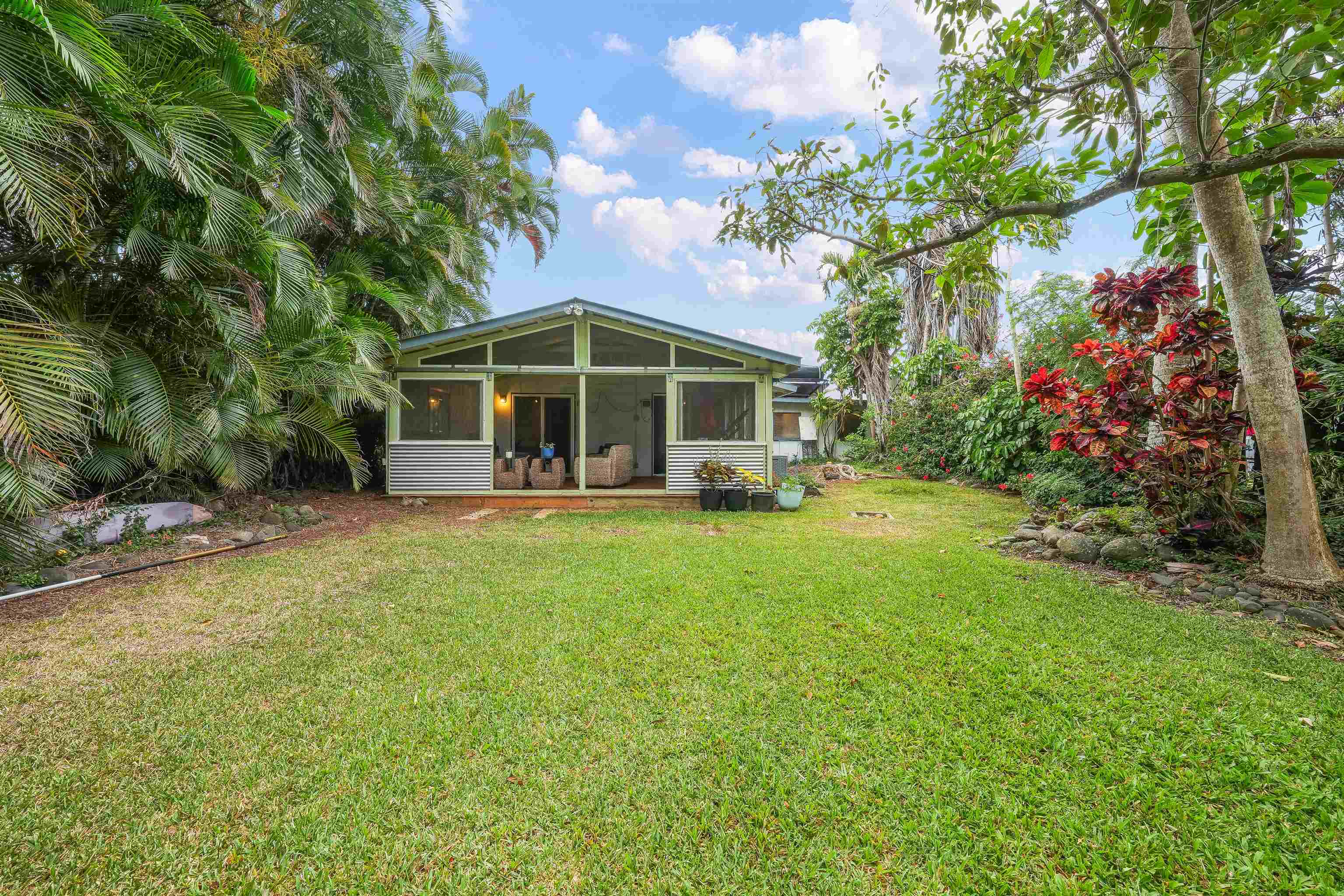 2889 West Lelehuna Place Haiku, HI 96708 - Photo 29 of 32 a view of a house with a yard