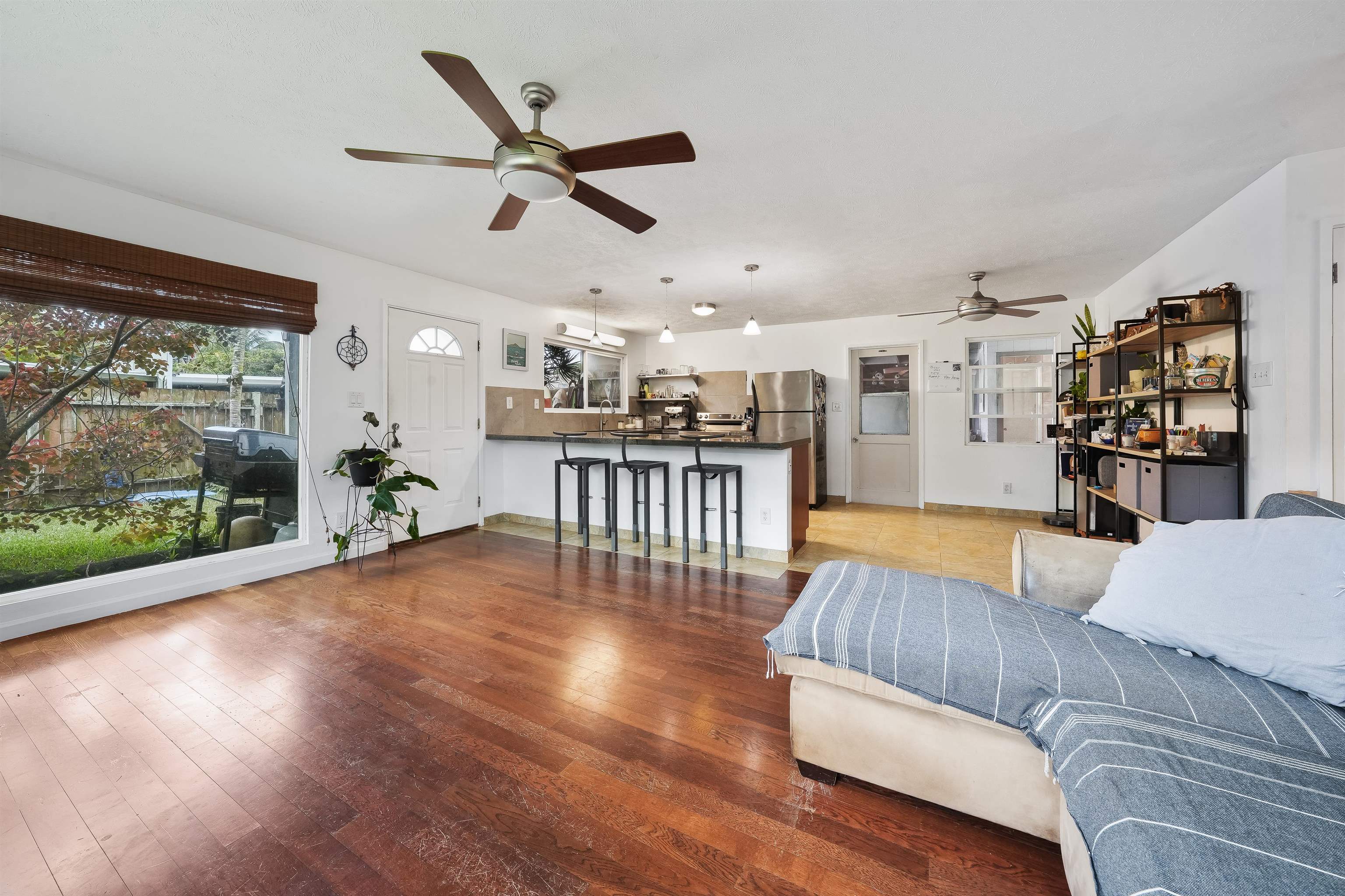 2889 West Lelehuna Place Haiku, HI 96708 - Photo 7 of 32 a living room with furniture and a large window