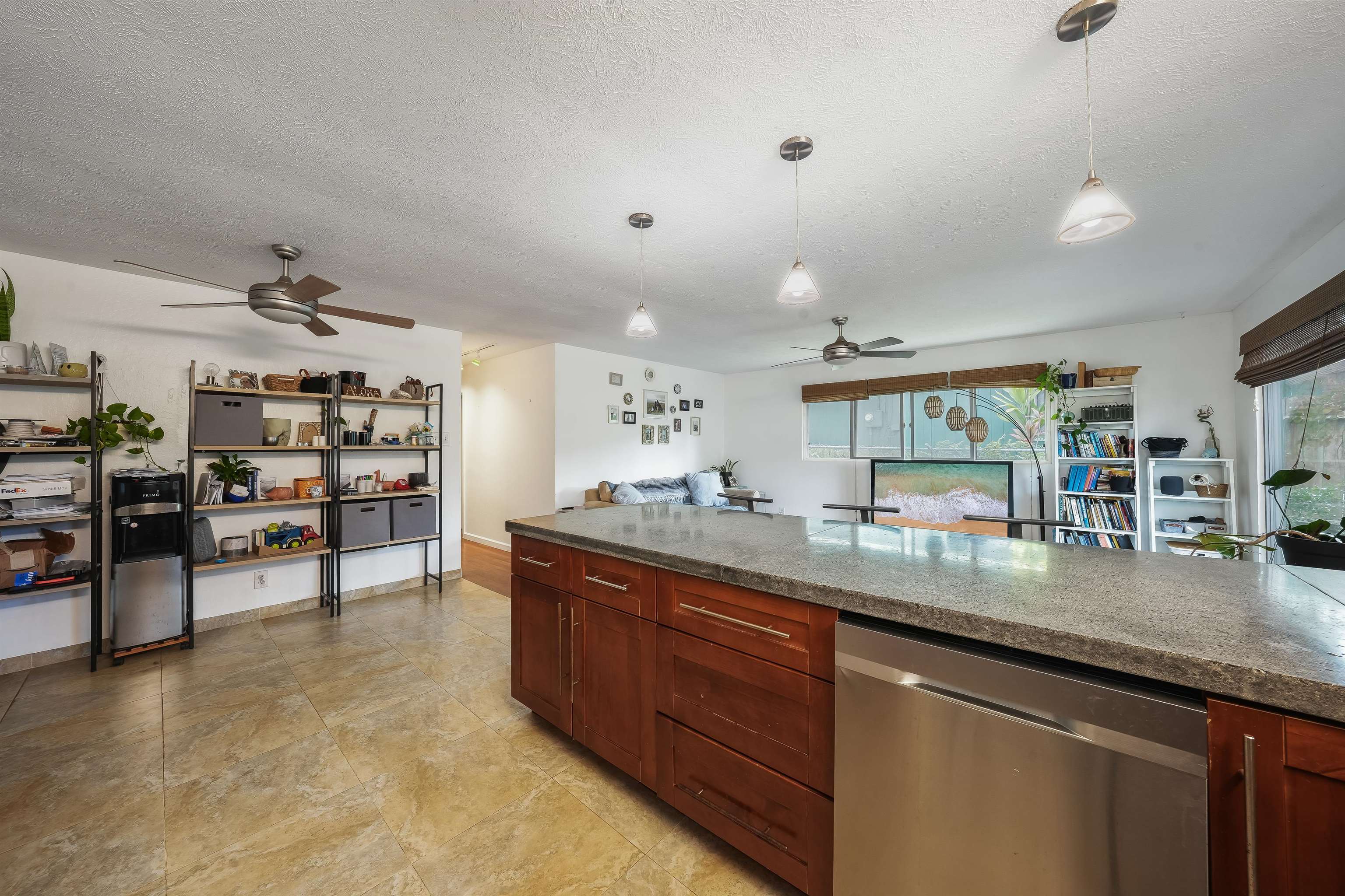 2889 West Lelehuna Place Haiku, HI 96708 - Photo 9 of 32 a kitchen with stainless steel appliances granite countertop a sink and cabinets