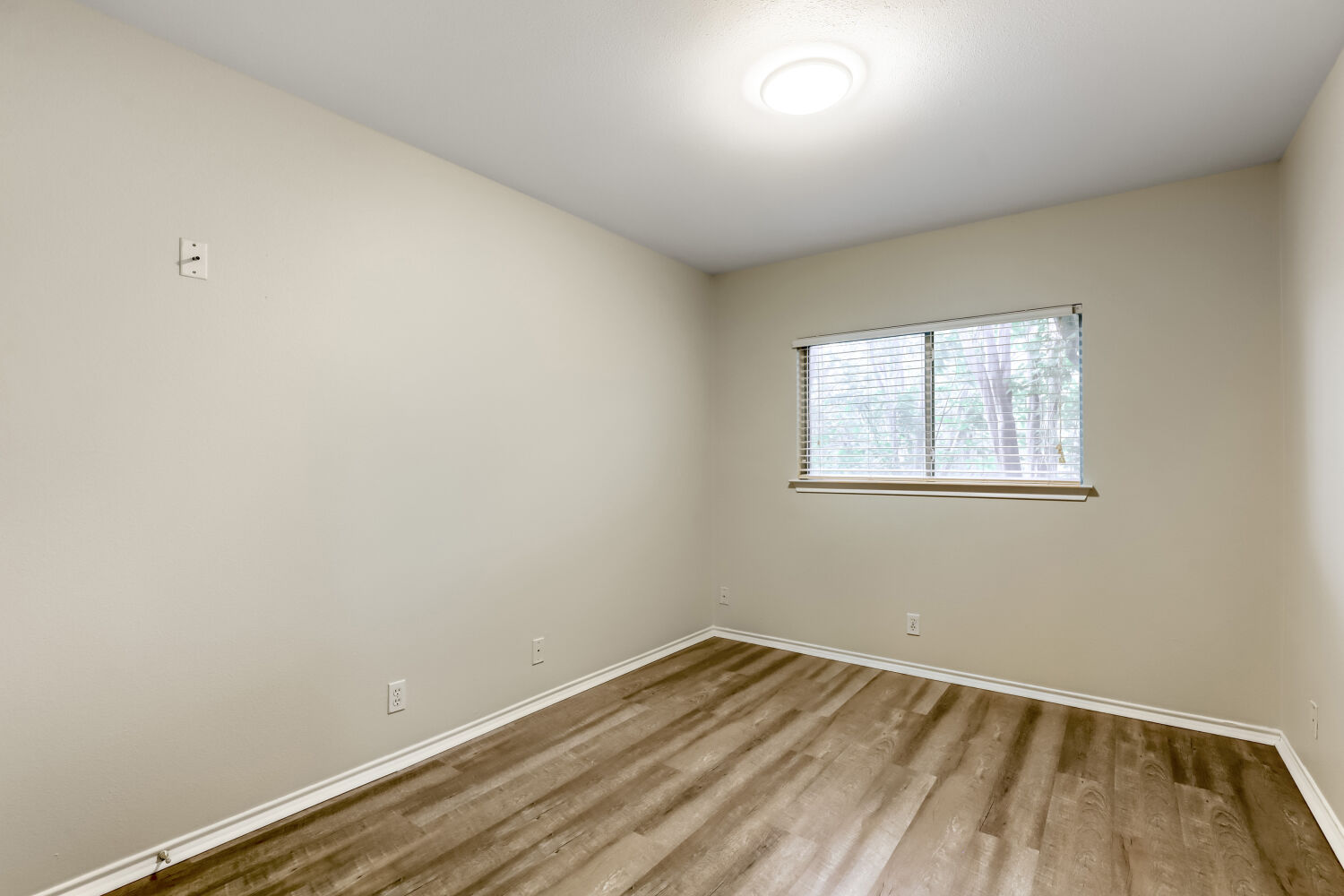 7411 Pusch Ridge Loop Austin, TX 78749 - Photo 20 of 29 wooden floor in an empty room