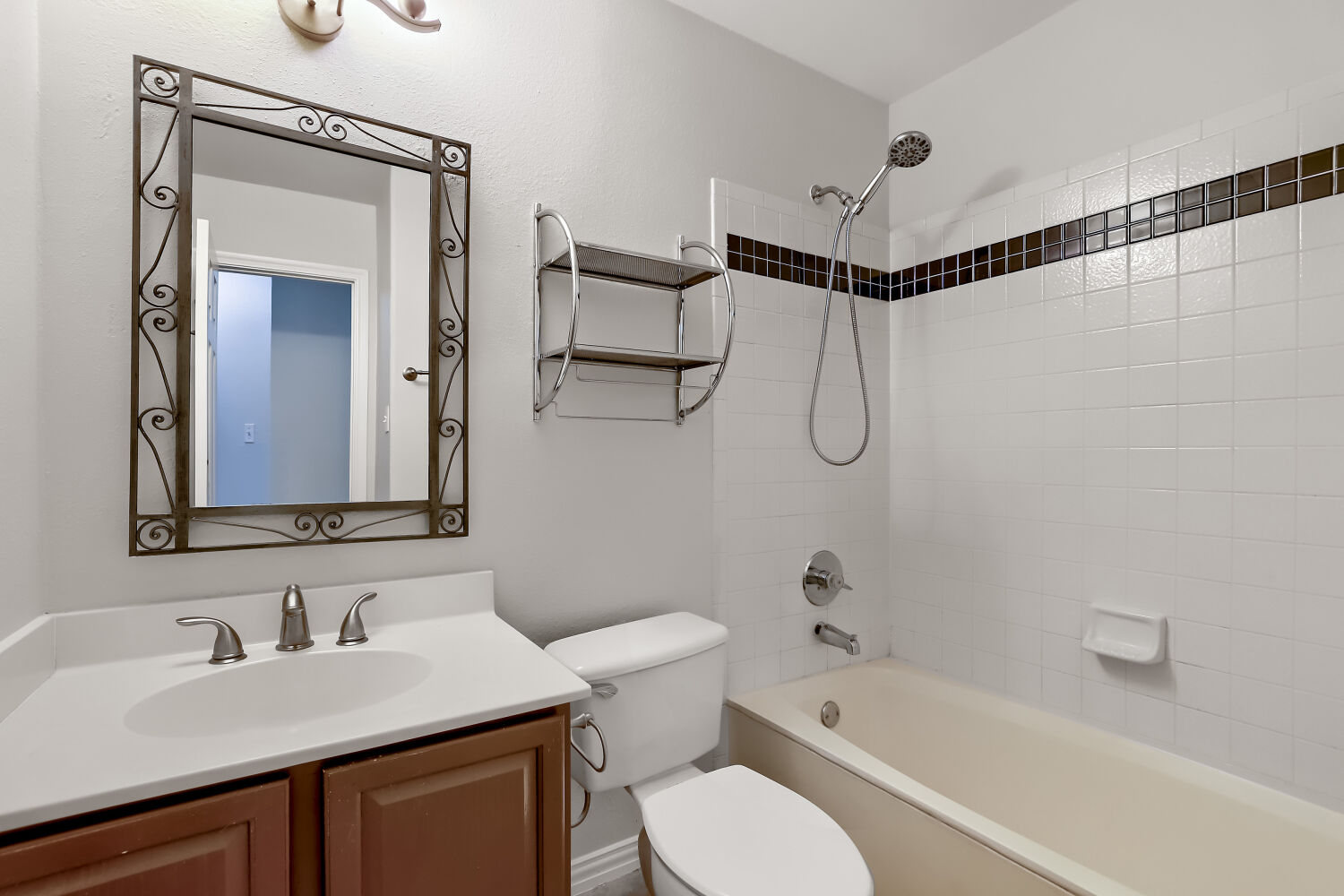7411 Pusch Ridge Loop Austin, TX 78749 - Photo 24 of 29 a bathroom with a sink vanity granite toilet tub and shower