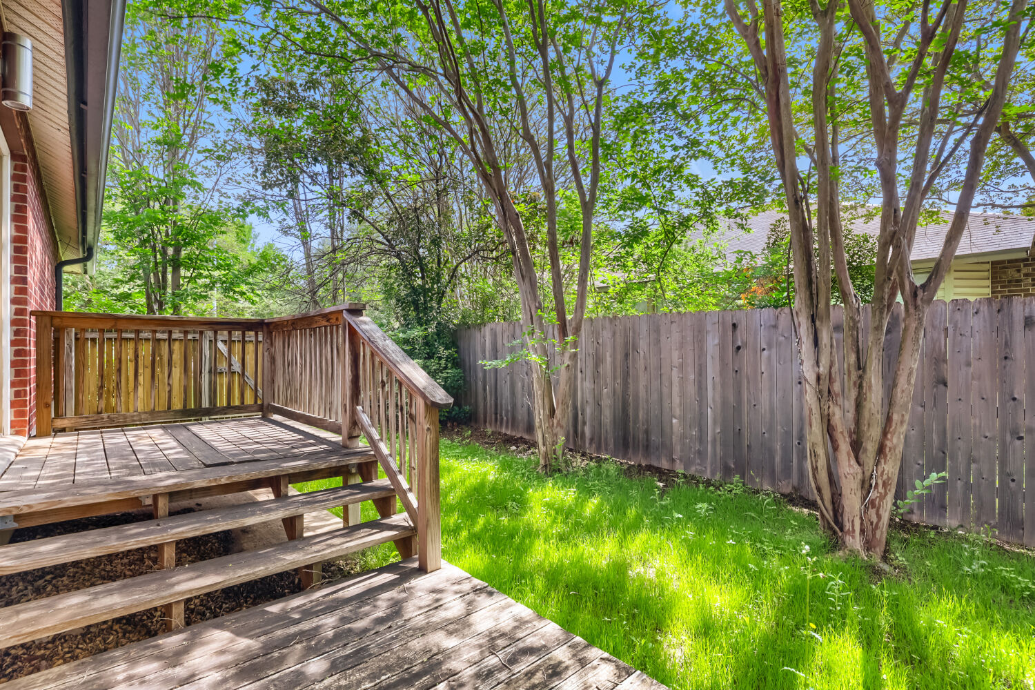 7411 Pusch Ridge Loop Austin, TX 78749 - Photo 28 of 29 a view of a wooden fence with a bench in the backyard