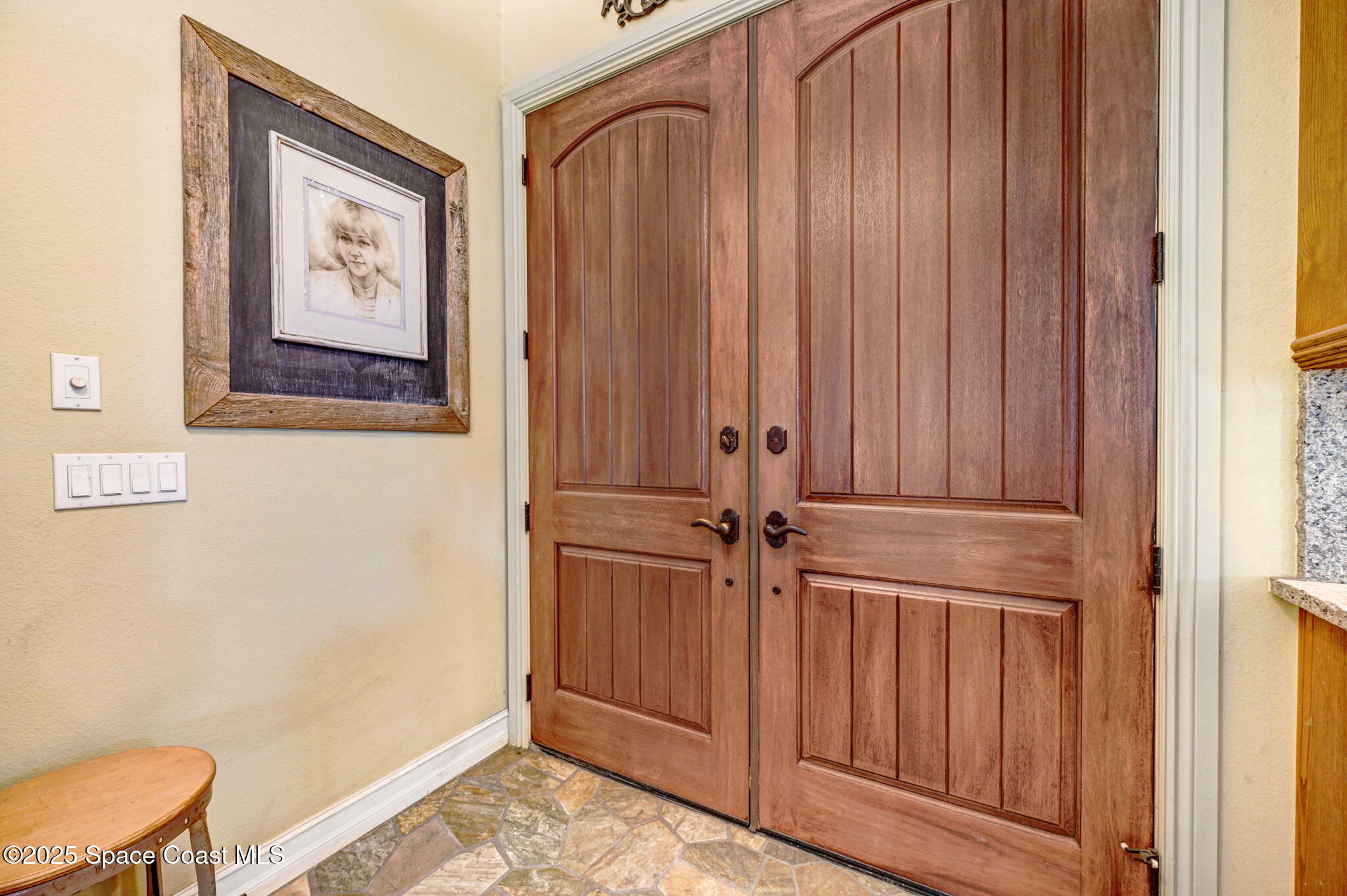 4495 Sand Point Road Grant, FL 32949 - Photo 35 of 87 a view of front door with wooden walls