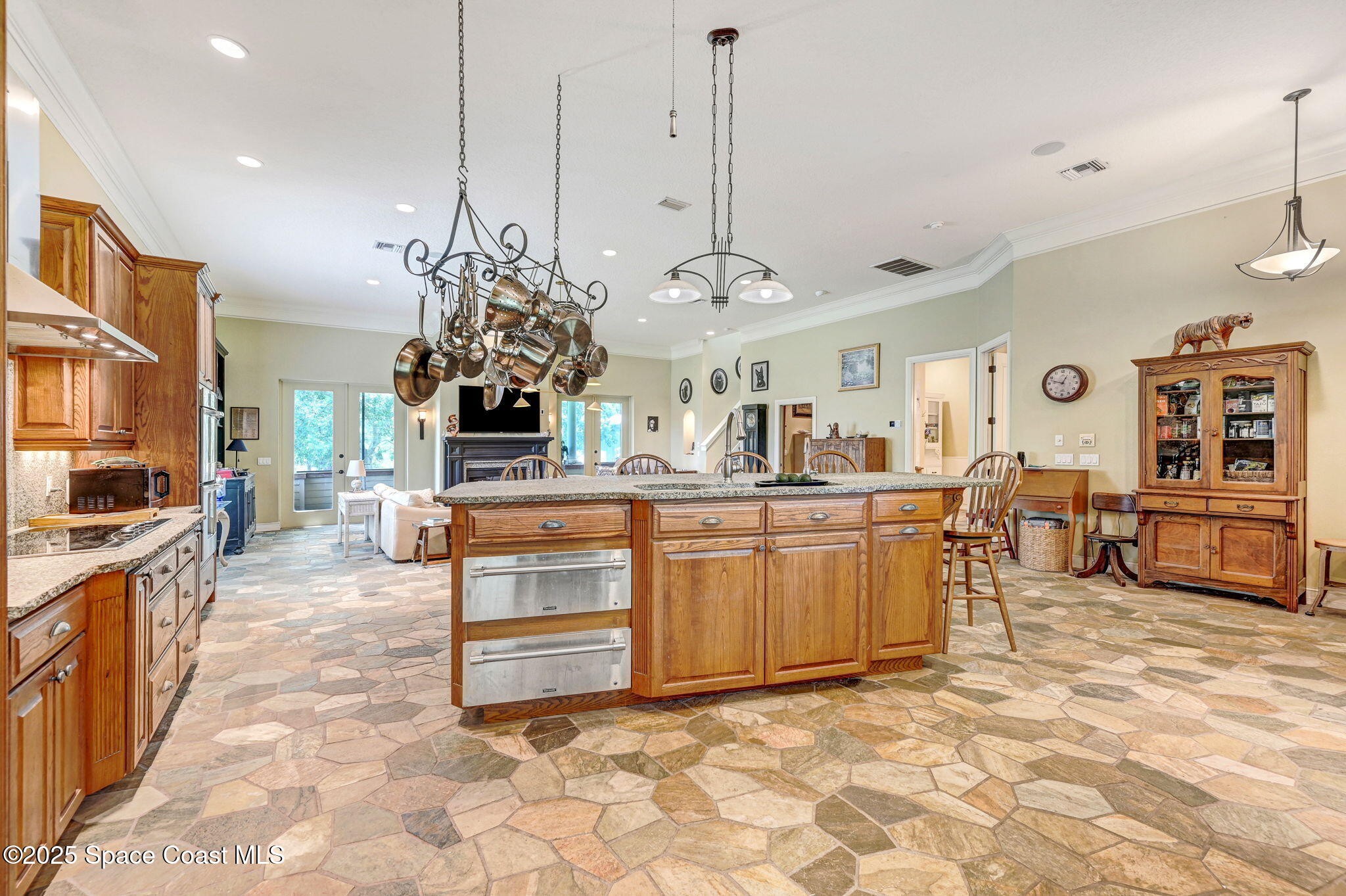 4495 Sand Point Road Grant, FL 32949 - Photo 39 of 87 a view of a kitchen with kitchen island granite countertop lots of counter top space