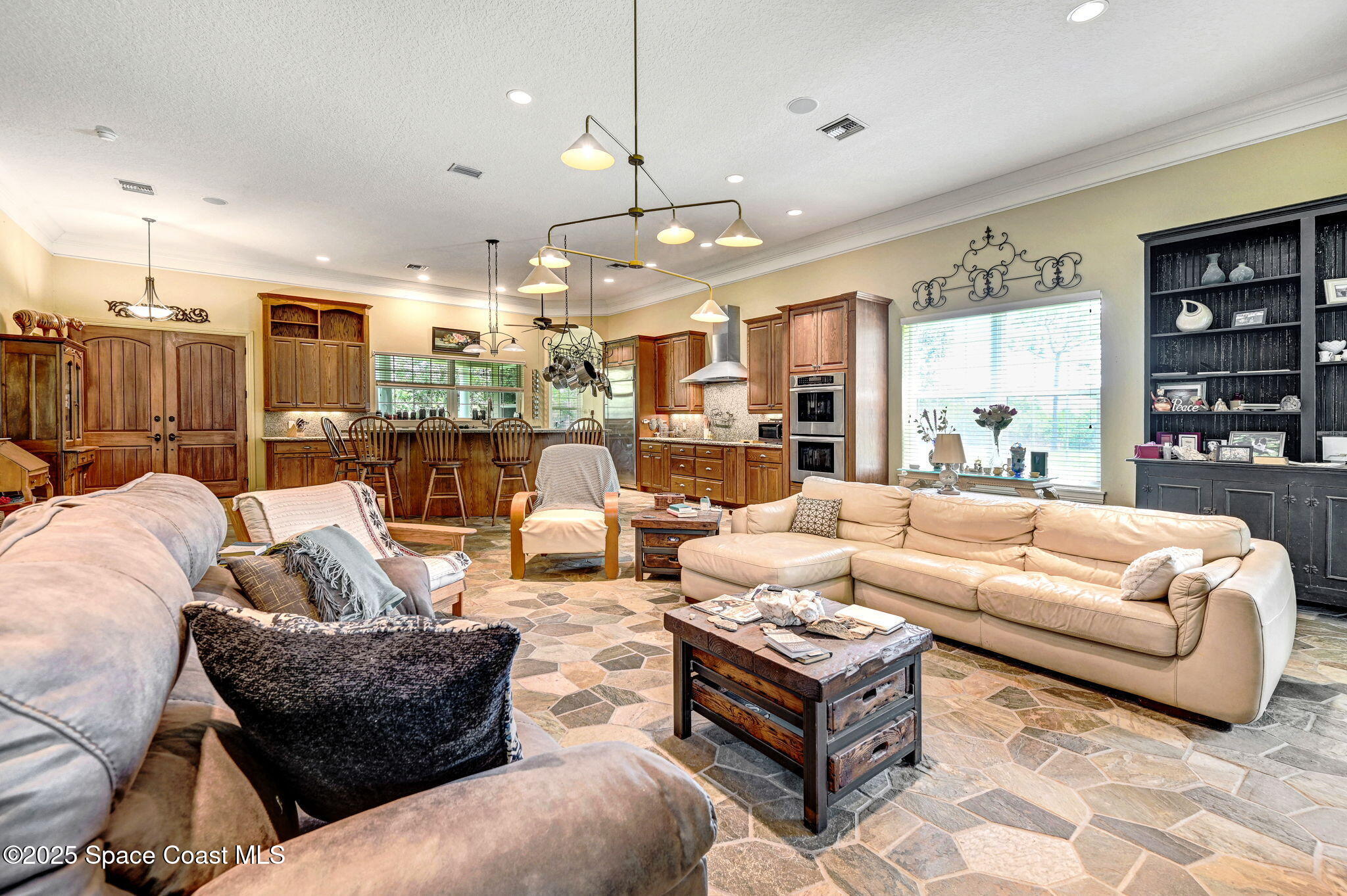 4495 Sand Point Road Grant, FL 32949 - Photo 47 of 87 a living room with furniture and a large window
