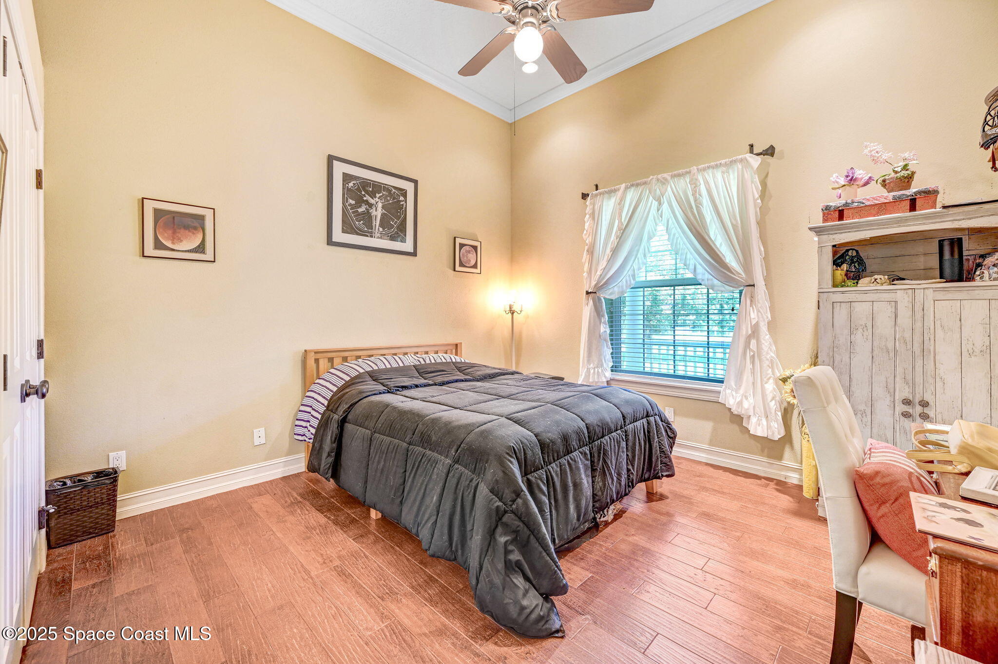 4495 Sand Point Road Grant, FL 32949 - Photo 53 of 87 a bedroom with a bed and a window