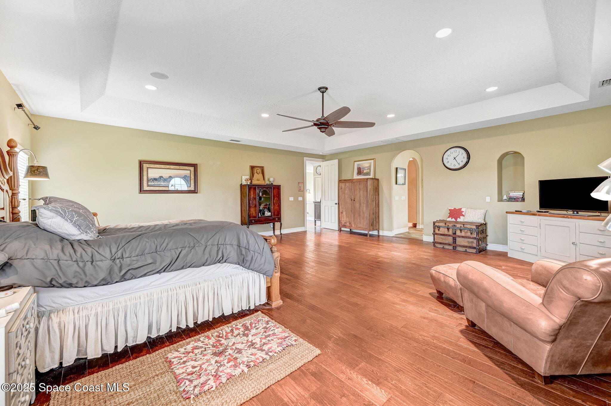 4495 Sand Point Road Grant, FL 32949 - Photo 62 of 87 a living room with furniture and a flat screen tv