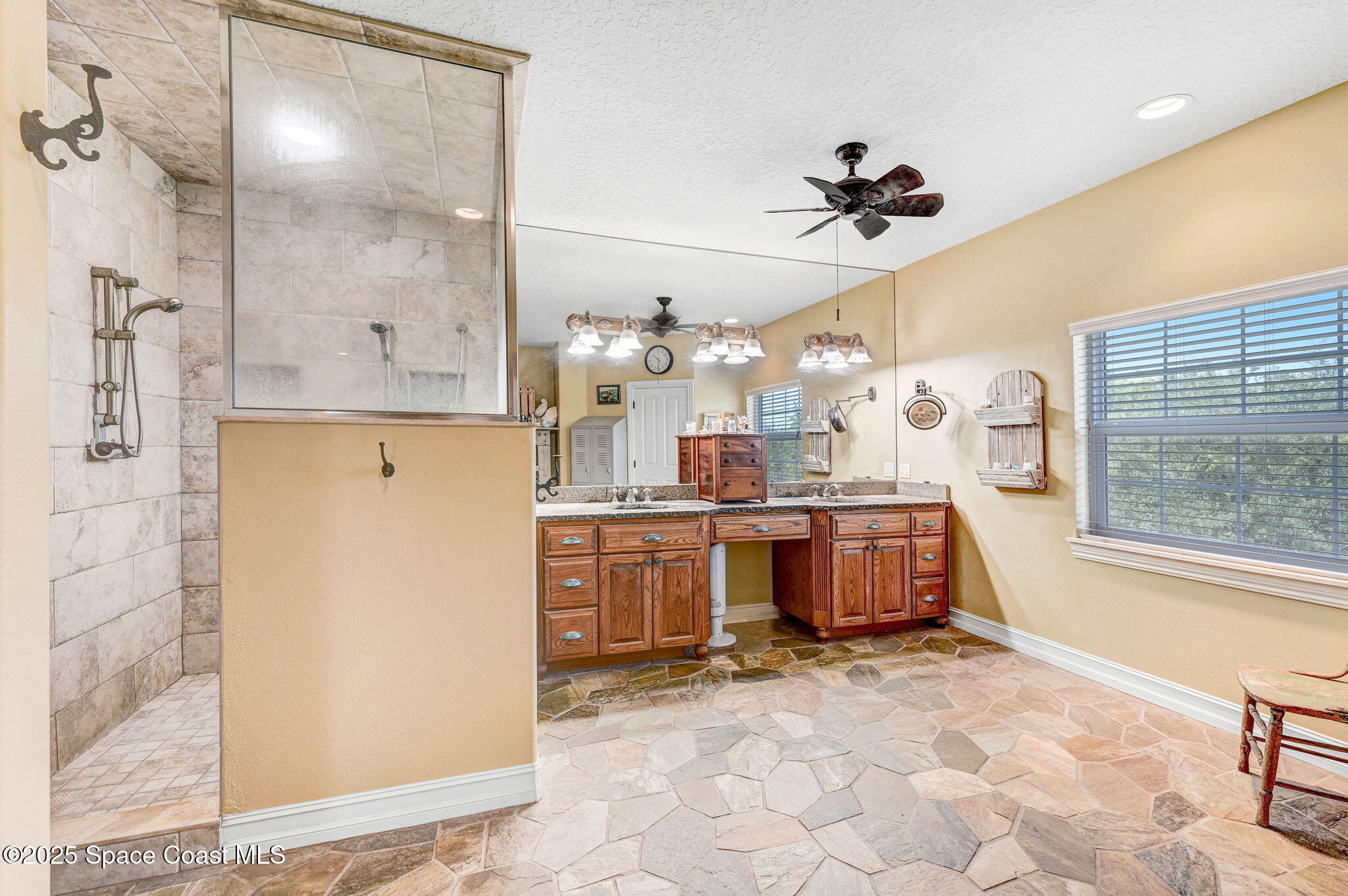 4495 Sand Point Road Grant, FL 32949 - Photo 64 of 87 a kitchen with a refrigerator and a sink