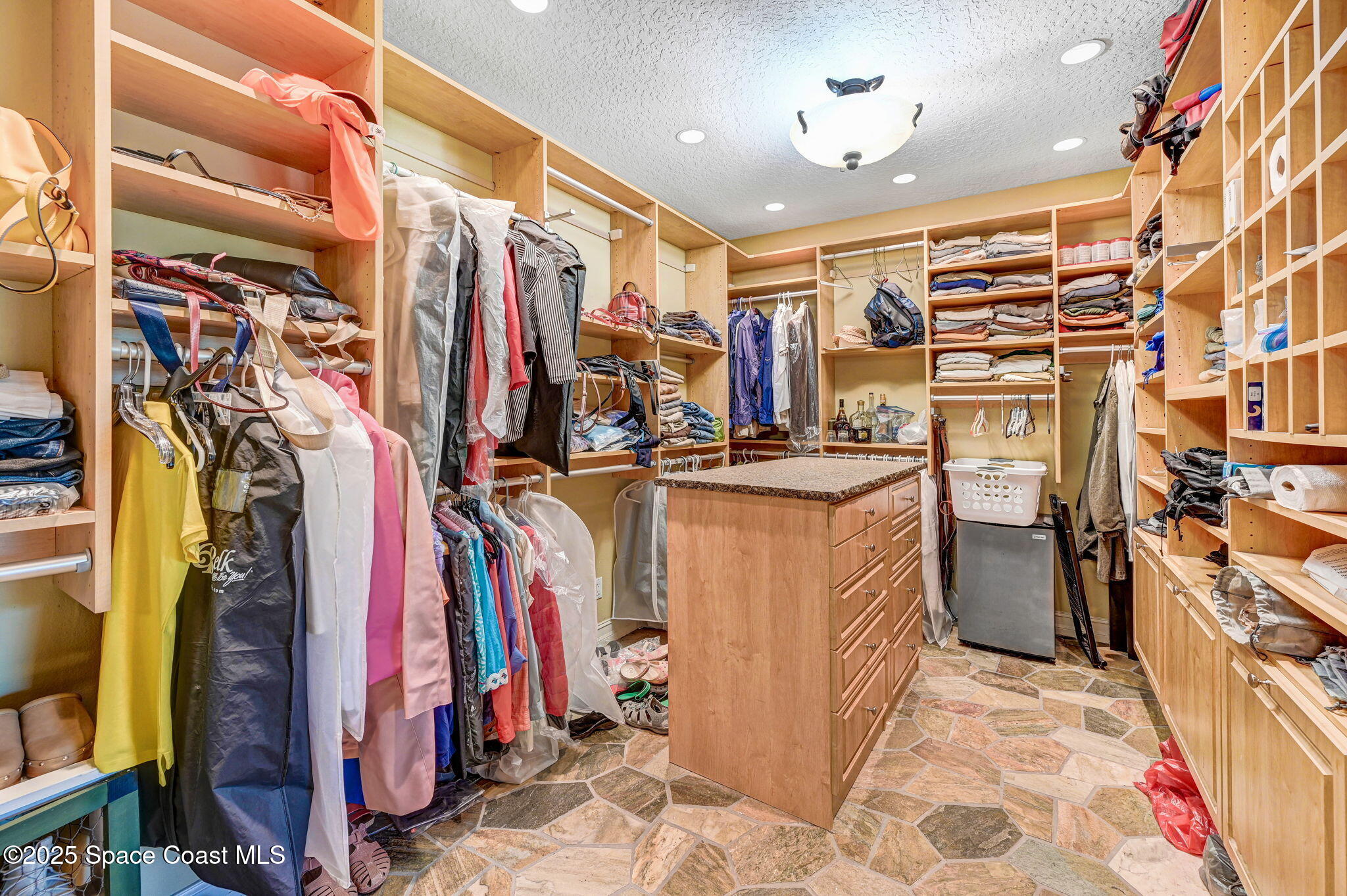 4495 Sand Point Road Grant, FL 32949 - Photo 65 of 87 a view of a walk in closet