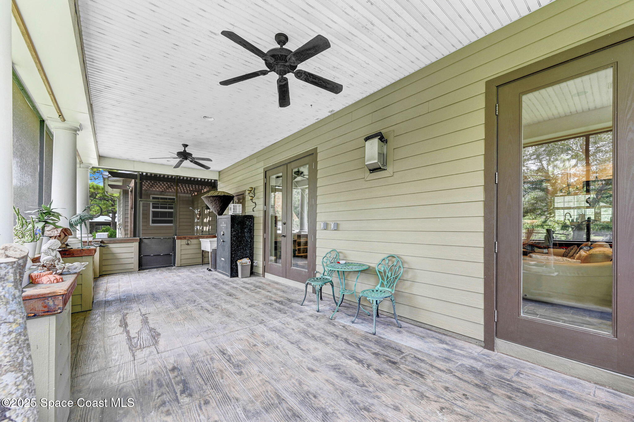 4495 Sand Point Road Grant, FL 32949 - Photo 69 of 87 a view of a livingroom with furniture and a ceiling fan