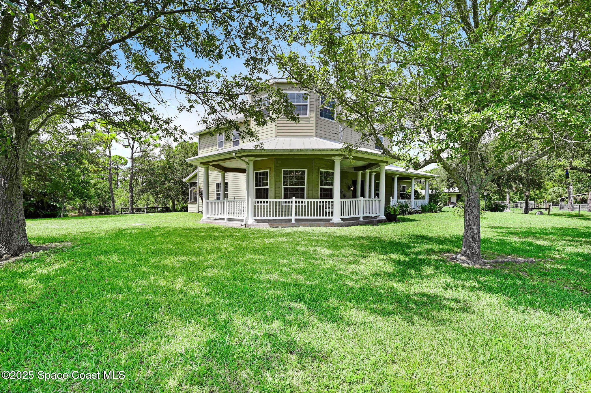 4495 Sand Point Road Grant, FL 32949 - Photo 74 of 87 a view of a house with a backyard