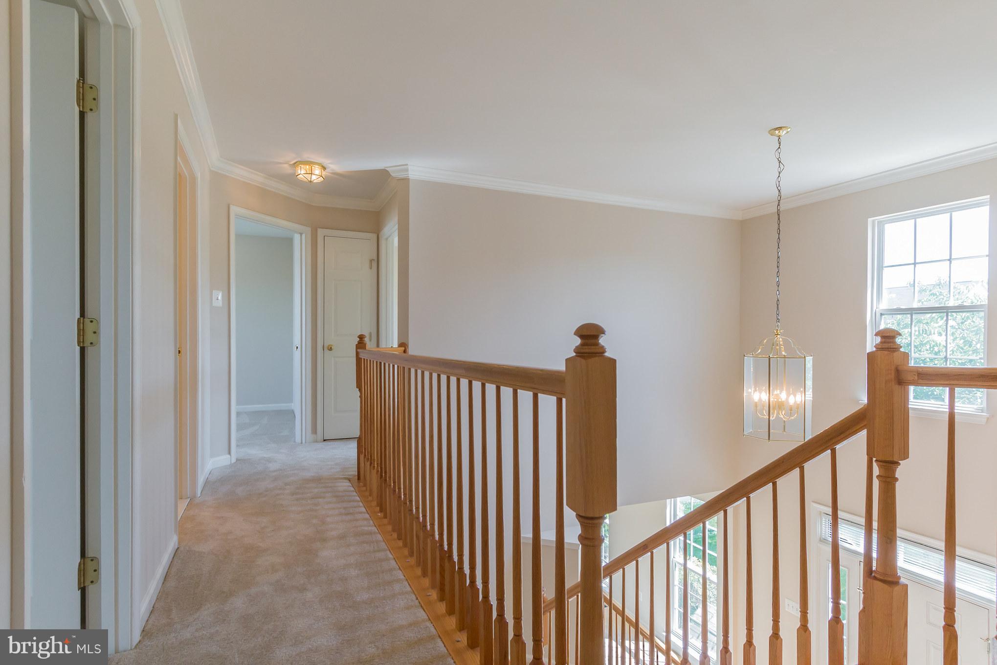 18410 Cornflower Road Boyds, MD 20841 - Photo 19 of 29 Upper Level Hall and Two-Story Foyer