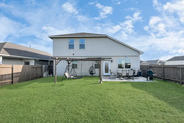 a garden view with a sitting space