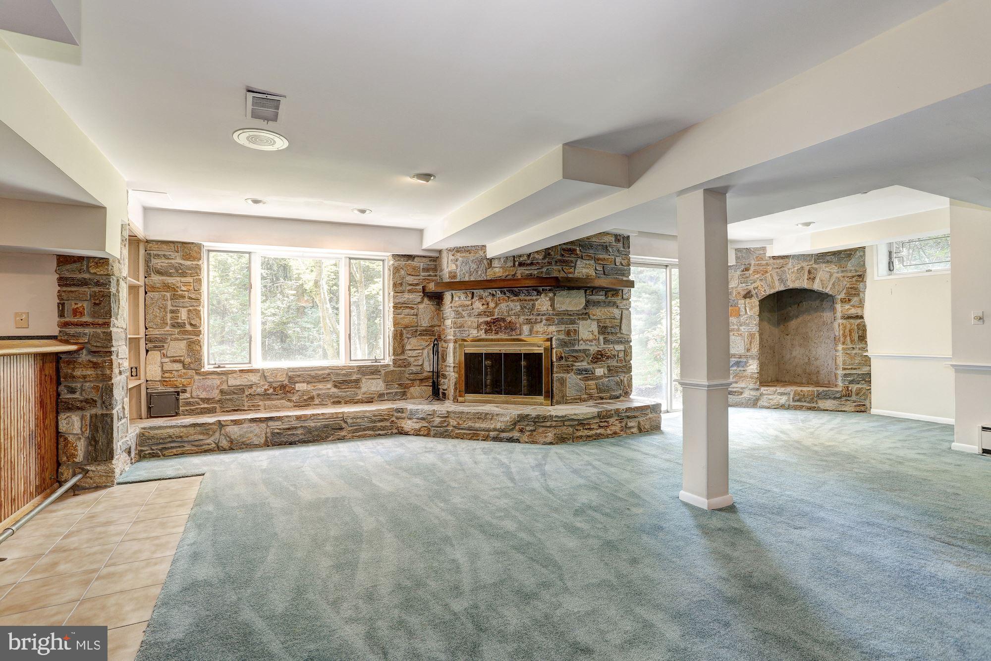 2113 Highland Ridge Drive Phoenix, MD 21131 - Photo 33 of 46 Lower Level with stone fireplace