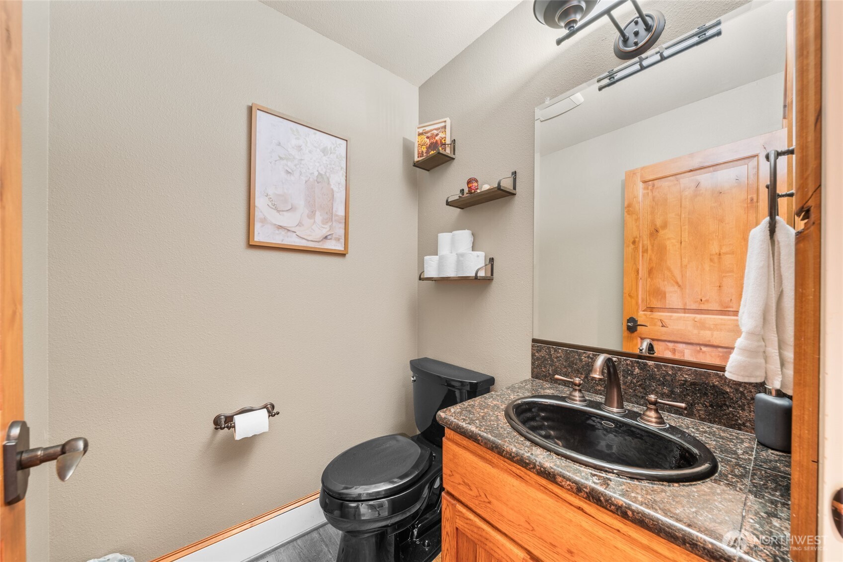 340 Arrowhead Road Ariel, WA 98603 - Photo 15 of 40 a bathroom with a sink a toilet and a window
