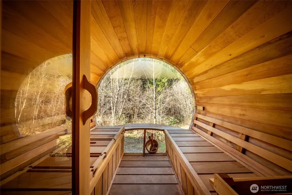 a view of a street with houses on both side