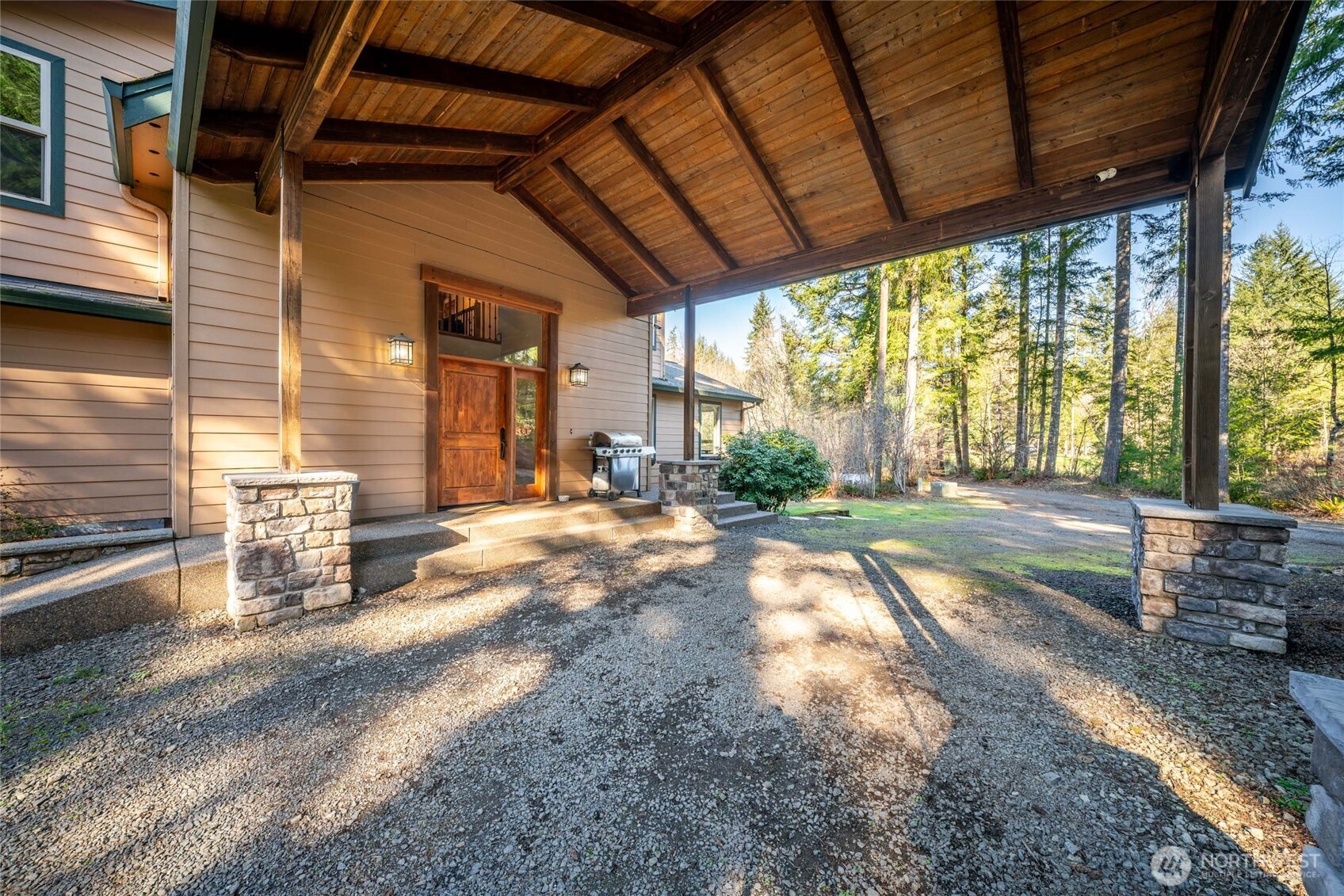 340 Arrowhead Road Ariel, WA 98603 - Photo 3 of 40 a view of a porch with wooden floor