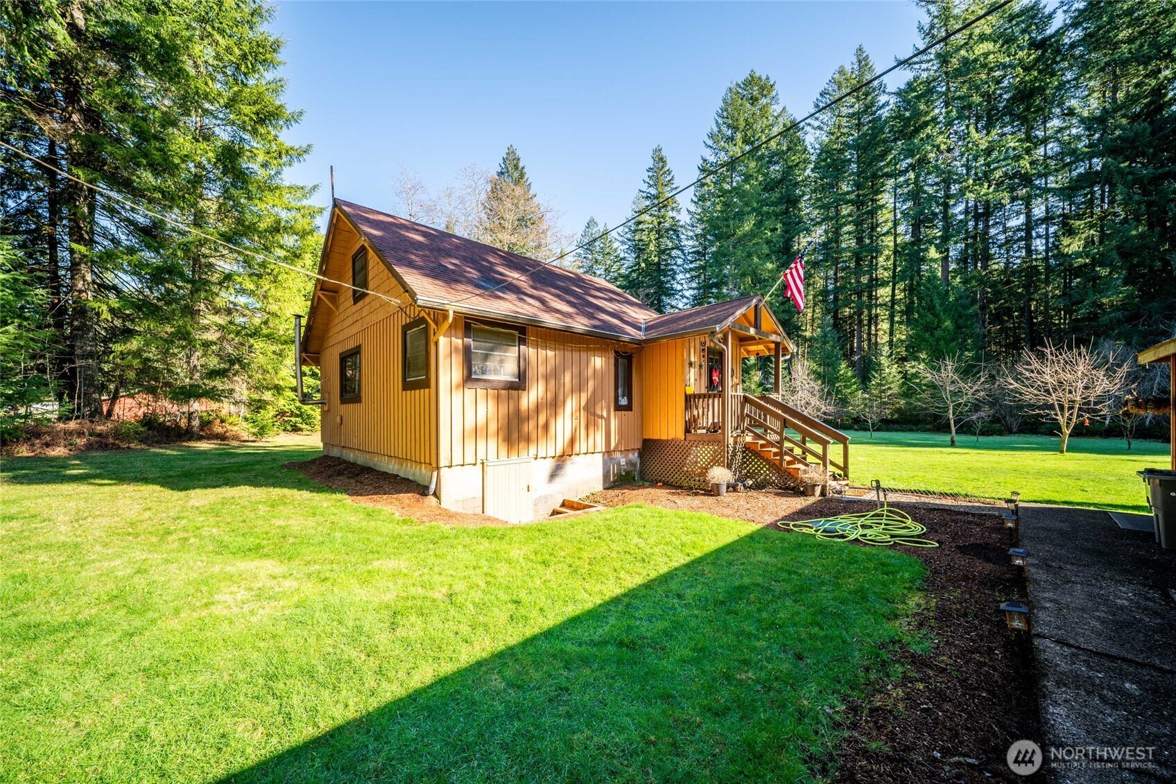 340 Arrowhead Road Ariel, WA 98603 - Photo 33 of 40 a view of a house with swimming pool and yard