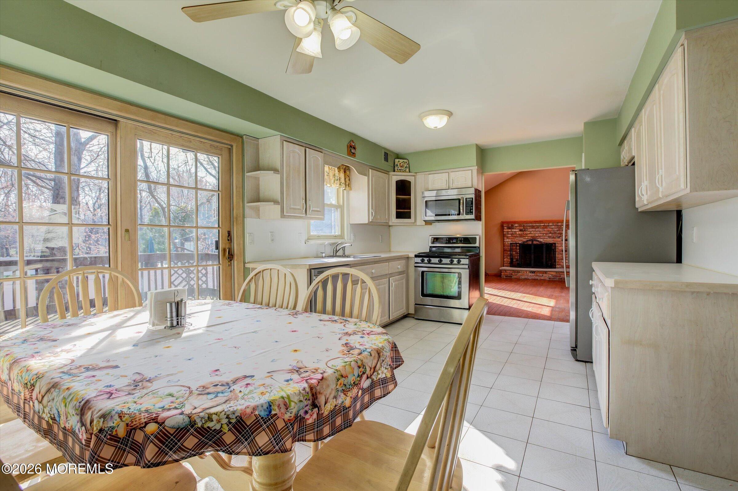 18 Warne Road Matawan, NJ 07747 - Photo 11 of 28 a bed room with a bed and a large window