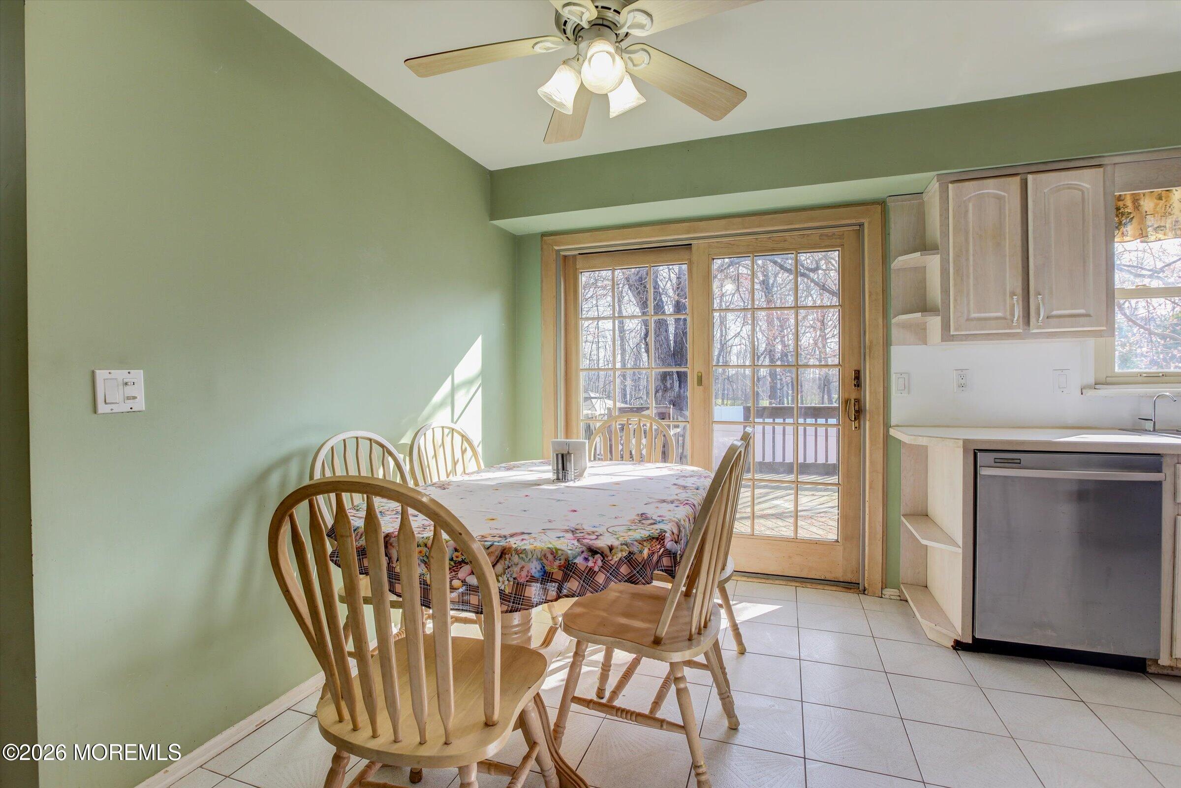 18 Warne Road Matawan, NJ 07747 - Photo 12 of 28 a view of a dining room with furniture window and outside view
