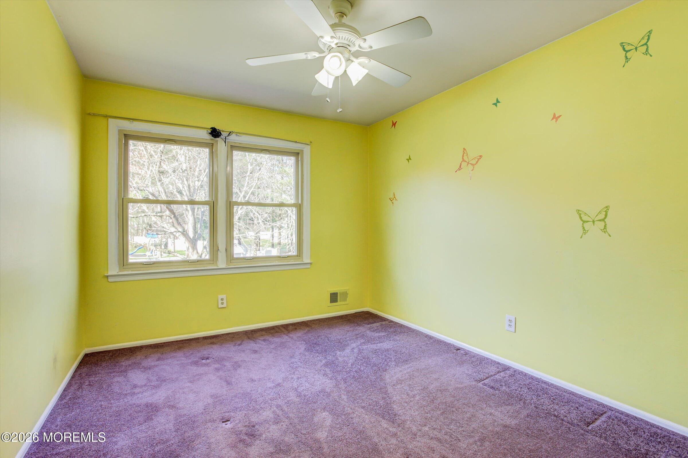 18 Warne Road Matawan, NJ 07747 - Photo 20 of 28 a view of a room that has a window in it