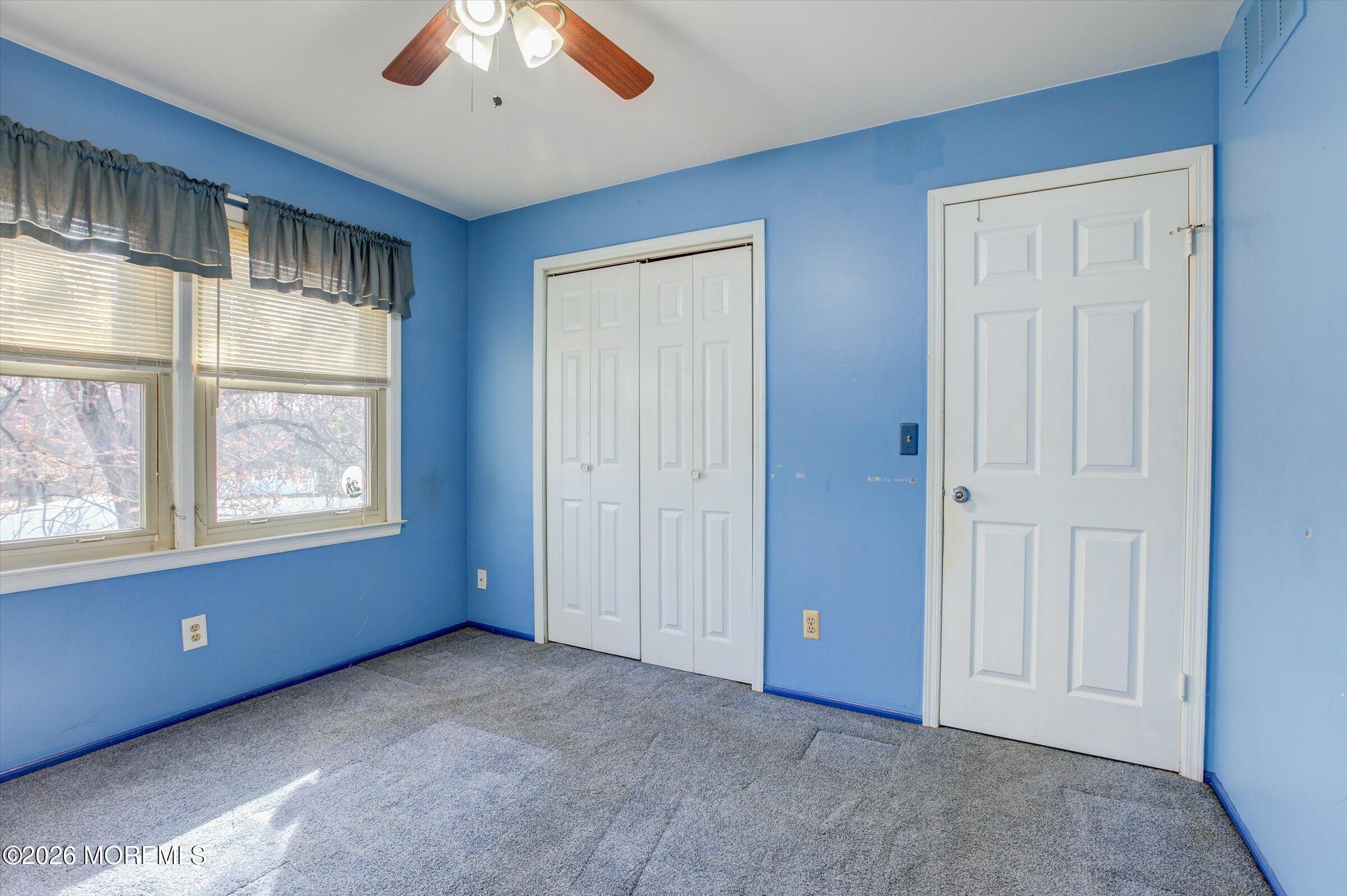 18 Warne Road Matawan, NJ 07747 - Photo 21 of 28 a view of an empty room with a window