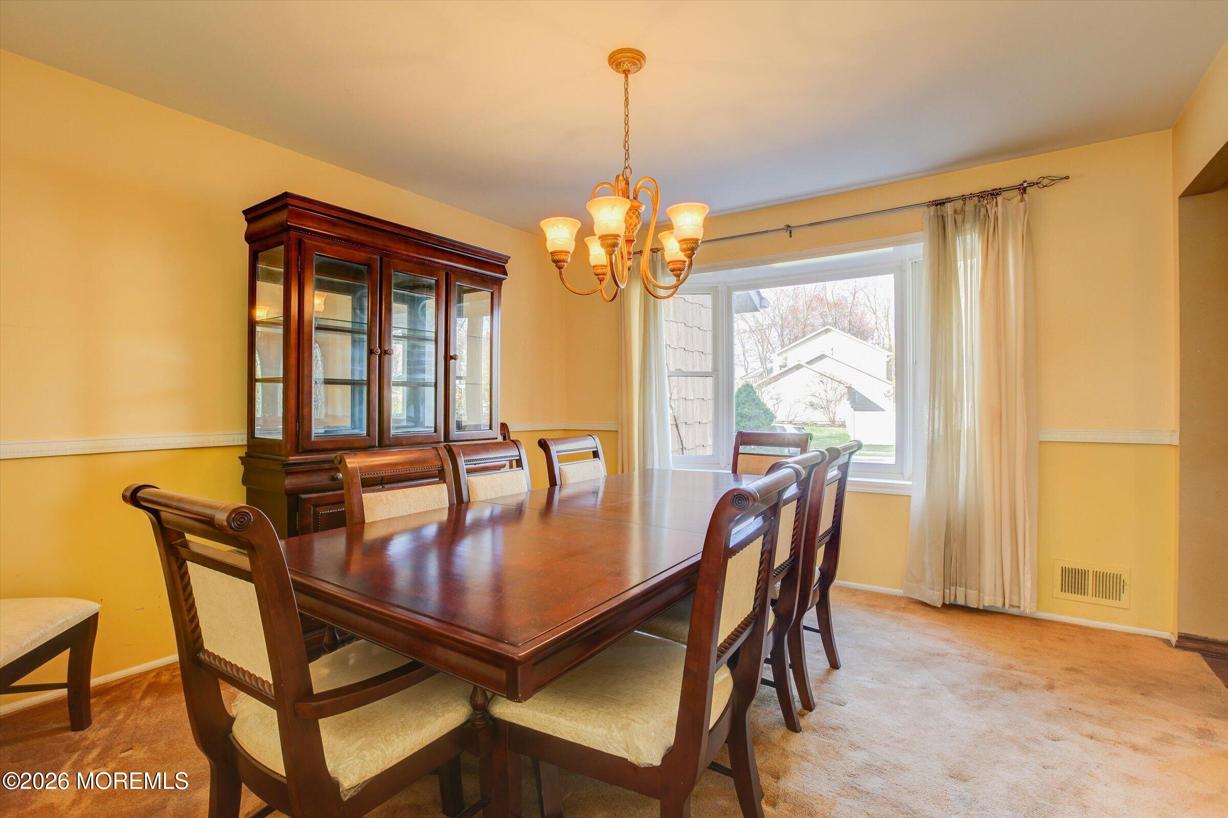 18 Warne Road Matawan, NJ 07747 - Photo 8 of 28 a dining room with furniture and window
