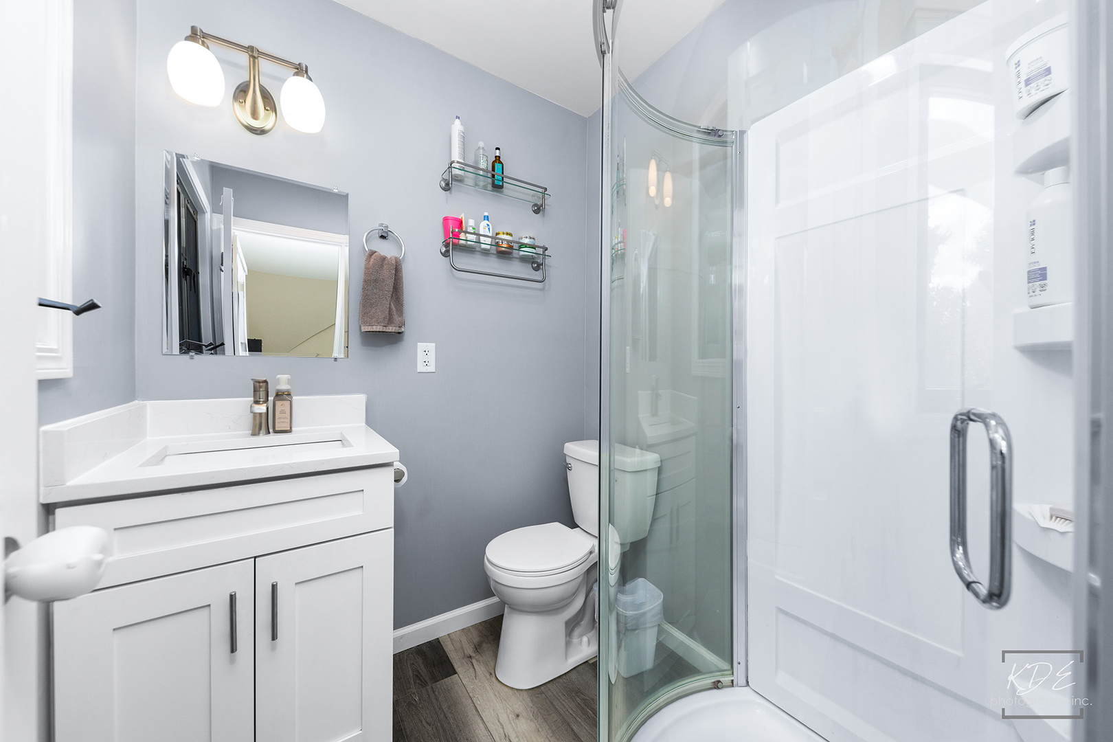 1244 Modaff Road Naperville, IL 60540 - Photo 9 of 19 a bathroom with a toilet sink and mirror
