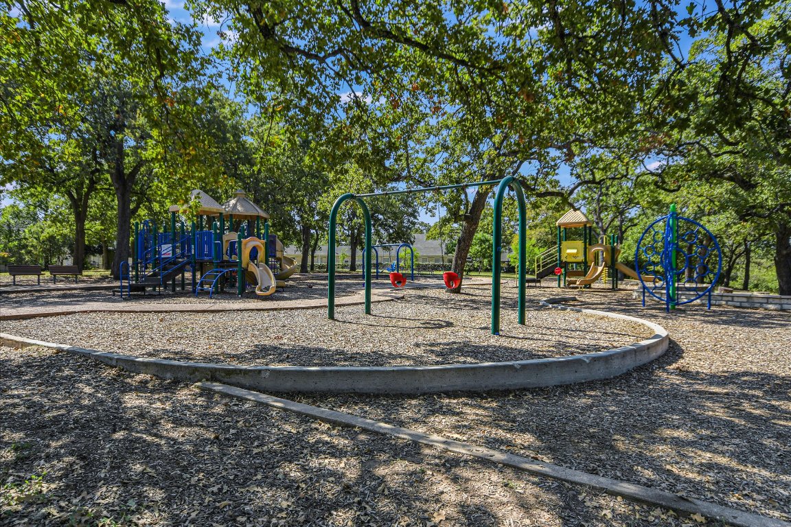 1320 Robert Browning Street, Unit 109 Austin, TX 78723 - Photo 11 of 16 a view of a park with trees