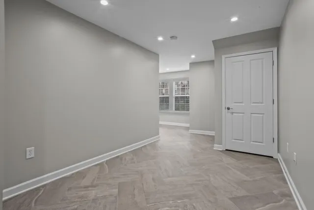 an empty room with a workbench