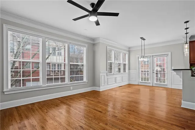a view of kitchen with wooden floor and window