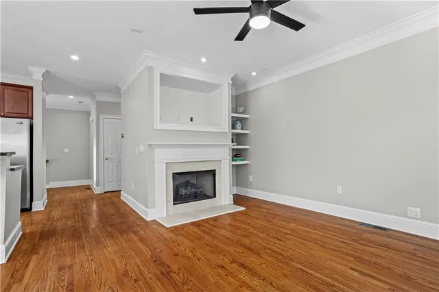 a close up of a bathtub with a shower