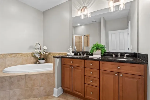 a outdoor dining area with chairs and wooden floor