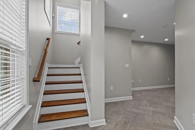 a workspace with furniture and potted plant