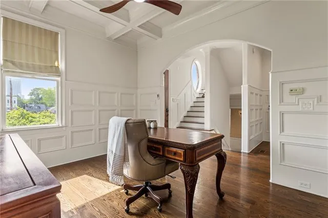 a kitchen with a sink and stainless steel appliances