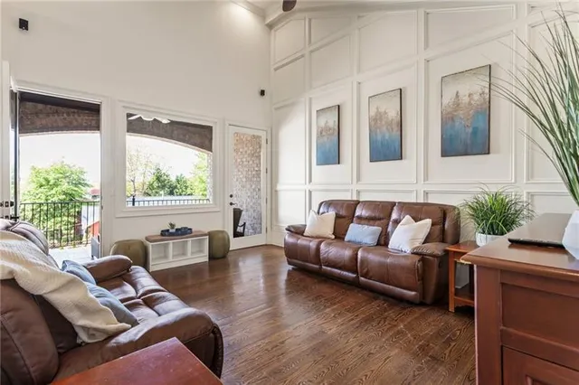 a bathroom with a granite countertop bathtub shower sink and mirror