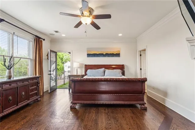 a view of hallway with wooden floor