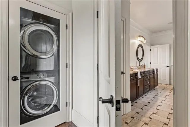 a view of a balcony with table and chairs
