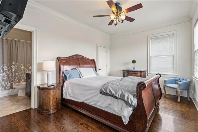 a view of a house with a yard balcony and furniture