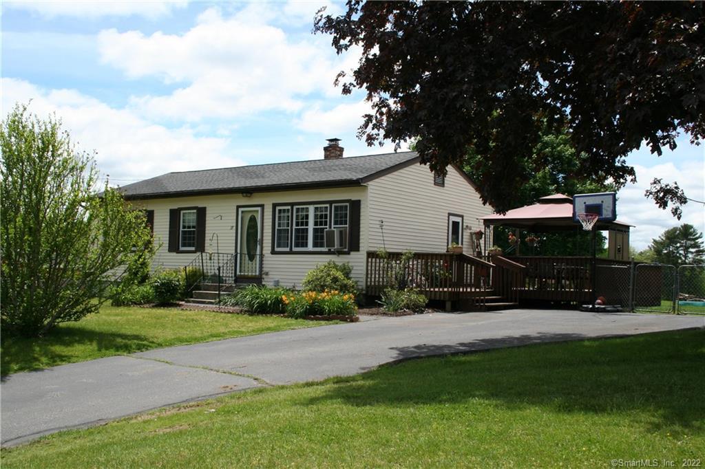 37 Park Road Plainfield, CT 06332 - Photo 1 of 1 a front view of house with yard and green space