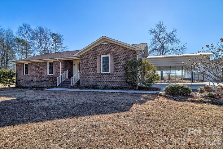 1139 Merribrook Lane Lancaster, SC 29720 - Photo 2 of 37 a front view of a house with garden