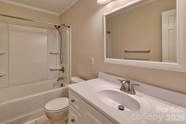 1139 Merribrook Lane Lancaster, SC 29720 - Photo 22 of 37 a bathroom with a sink toilet and shower