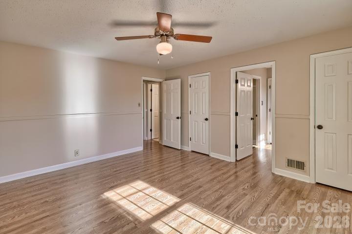 1139 Merribrook Lane Lancaster, SC 29720 - Photo 25 of 37 wooden floor in an empty room with a window