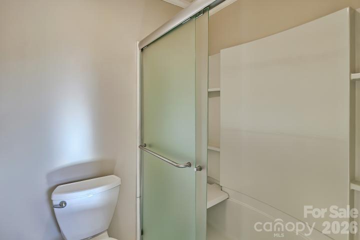 1139 Merribrook Lane Lancaster, SC 29720 - Photo 27 of 37 a bathroom with a toilet and shower