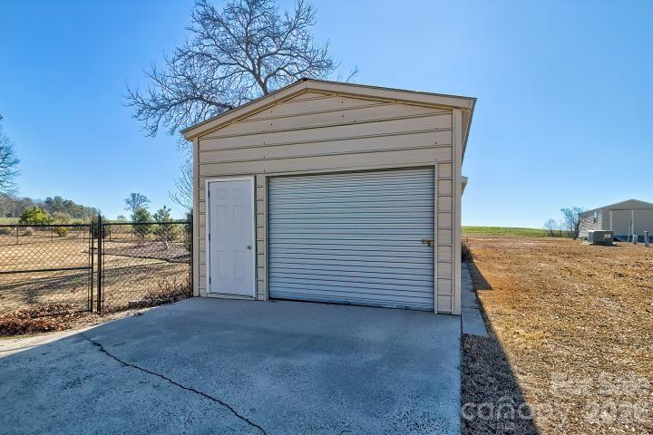 1139 Merribrook Lane Lancaster, SC 29720 - Photo 34 of 37 a view of a house with a backyard